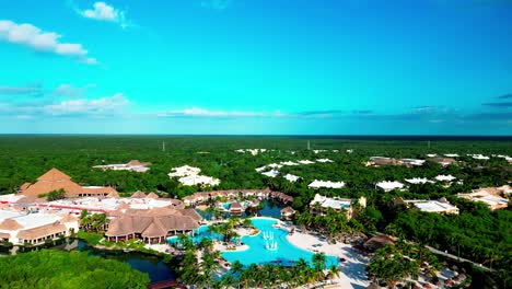 tulum mexico panning left drone view of a luxury resort called trs