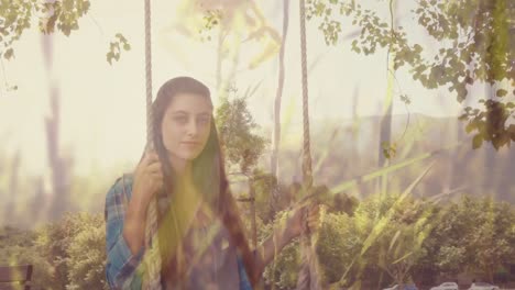 Woman-sitting-on-a-swing