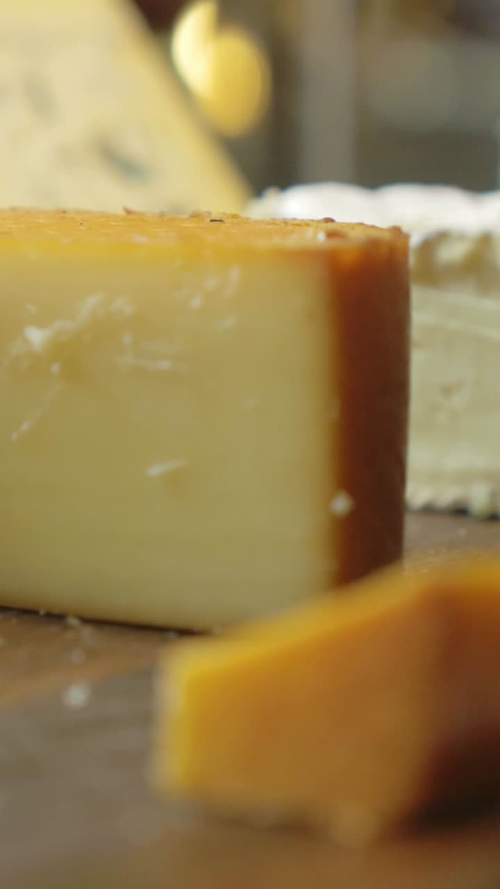 Close-up of Cheese Being Cut
