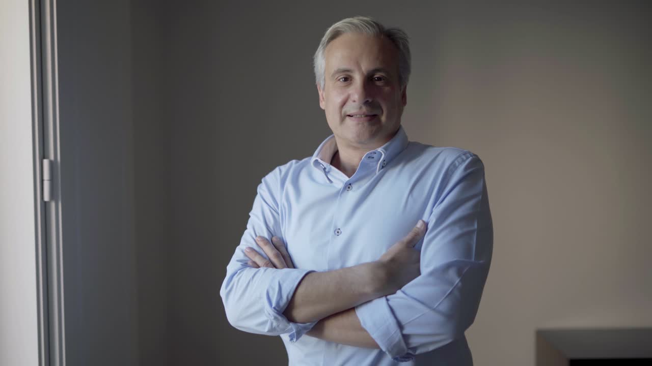 Video portrait of confident middle aged Caucasian businessman