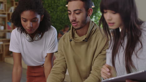 young-multi-ethnic-business-people-brainstorming-team-leader-man-sharing-ideas-students-working-together-on-project-using-laptop-computer-planning-strategy-in-office-workplace