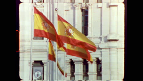 spanish flag waving on a building