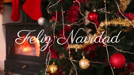 animation of feliz navidad over christmas presents, fireplace and tree