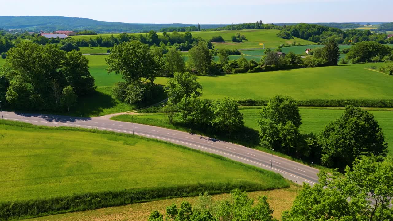 4K Aerial Drone Video of the Farmland Below the Historic Bamberg Castle on the edge of Bamberg, Germany on a Beautiful Spring Day