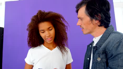 model and photographer interacting with each other 4k