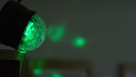 close up of coloured disco strobe lighting at house party