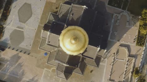 aerial view of a golden domed church