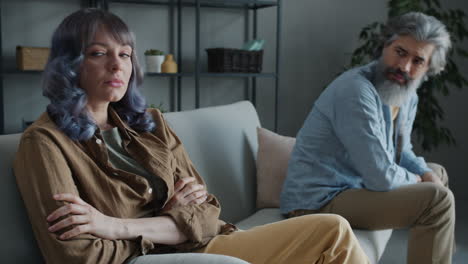 couple arguing on couch