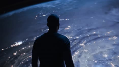 man gazing at earth from space