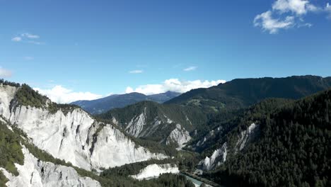 cinematic aerial view of ruinaulta, switzerland