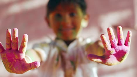 kids celebrating the hindu festival of holi in rajasthan, india