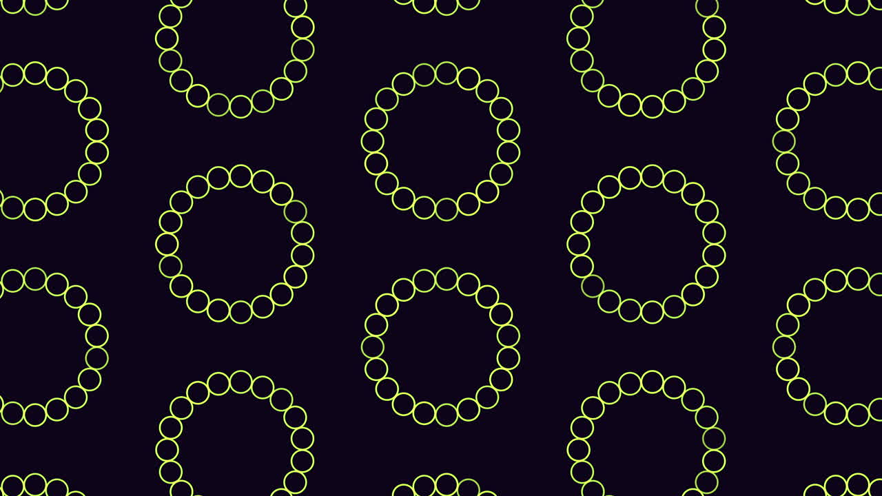 Circles pattern from rainbow rings on black gradient