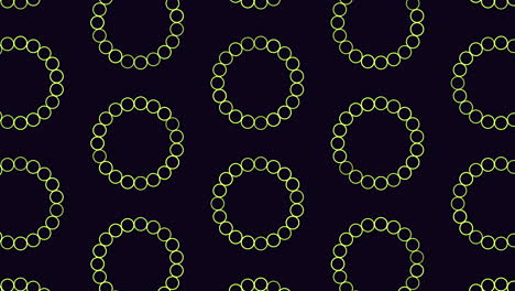 Circles-pattern-from-rainbow-rings-on-black-gradient