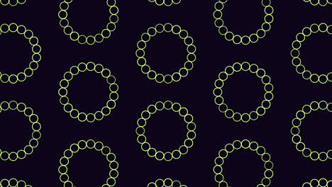 circles pattern from rainbow rings on black gradient