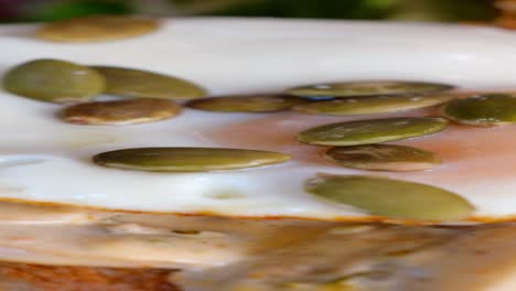 fried egg with pumpkin seeds on toast