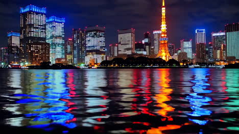 tokyo skyline at night with reflections