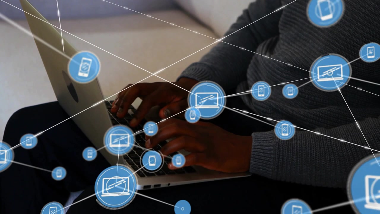 Woman typing on laptop causing blue nodes and white lines forming dense tech network over keyboard