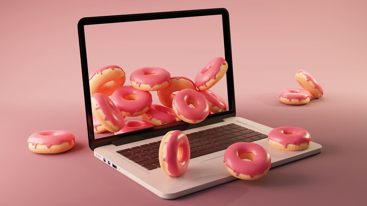 3d animation of laptop with donuts placed on pink surface