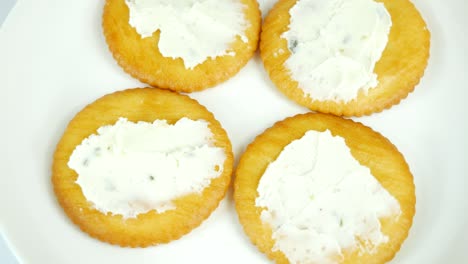 round crackers with herb cheese