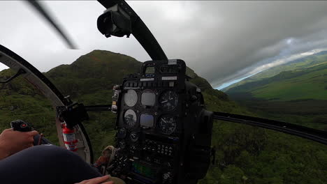 Helicopter-Flies-over-Green-Landscape-in-Kauai-Hawaii