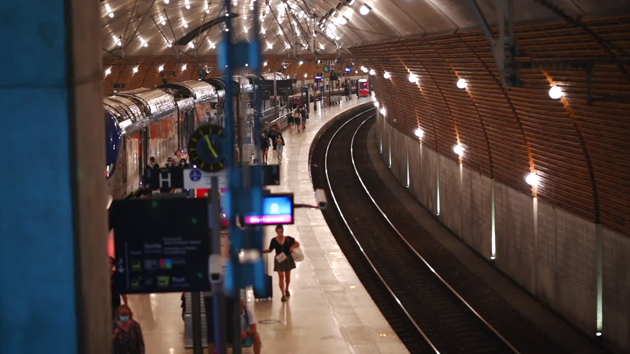 Train station in Monaco, tv screens with transportation timetables