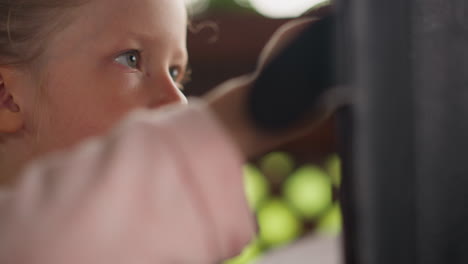 lirl with blue eyes chooses content via tablet in cafe