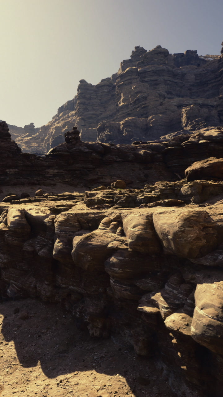 Rock formations in a desert landscape during morning light in a remote area