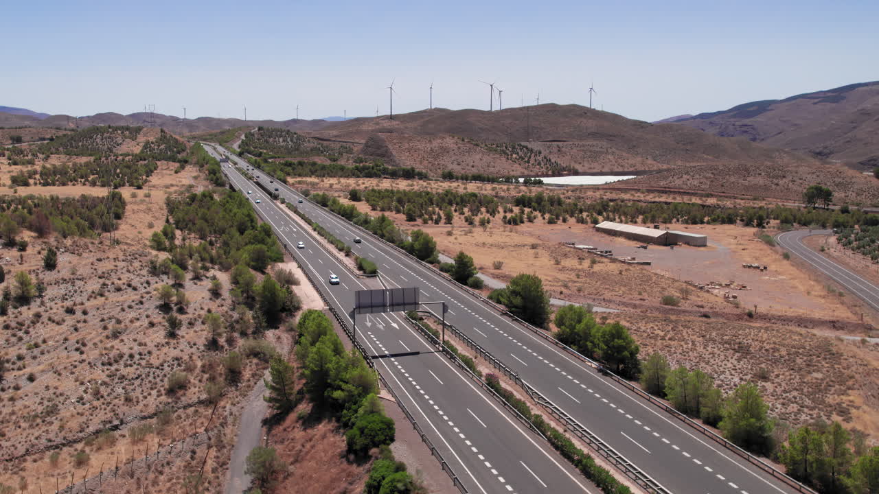 Drone flying up to reveal a highway in Andalusia, Spain