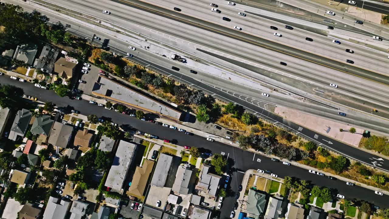 Streets with traffic, houses and trees, Los Angeles suburbs, in California, USA