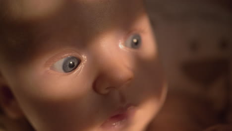 baby girl portrait sun light on her eyes