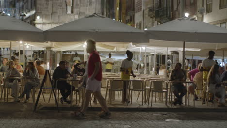 nighttime outdoor dining in a european city