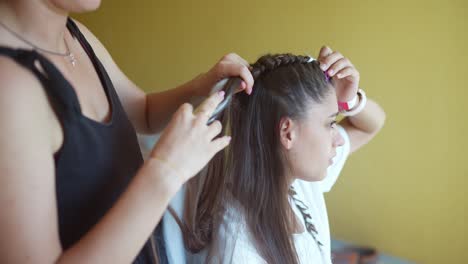 woman getting a braid style