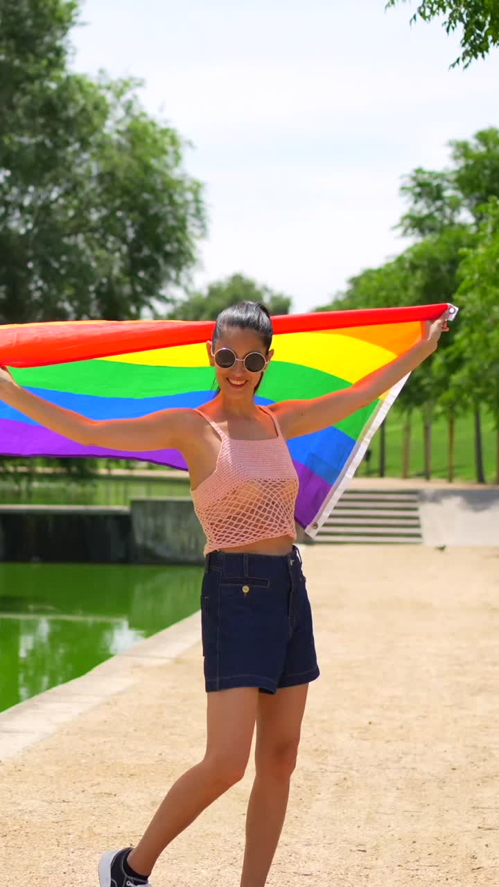 Woman Celebrates Pride with Rainbow Flag