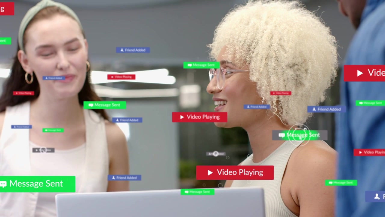 Woman leading laptop for marketing, content playing and generating floating UI labels around team
