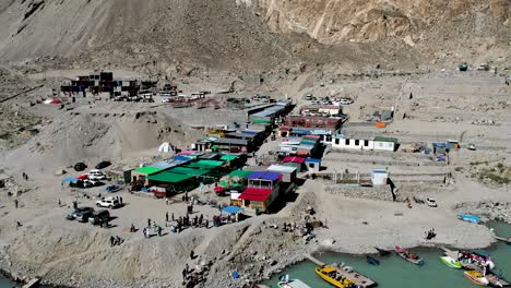 Aerial-view-of-the-shelters-surrounding-attabad-lake---Attabad-Lake,-located-in-the-Gojal-region-of-Hunza-Valley-in-Gilgit−Baltistan,-Pakistan