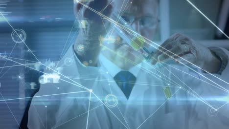 Animation-of-connected-dots,-graph-icons,-caucasian-transferring-liquid-to-test-tube-in-laboratory