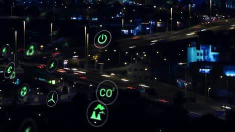 animación de múltiples iconos digitales contra una vista aérea del lapso de tiempo del tráfico nocturno de la ciudad