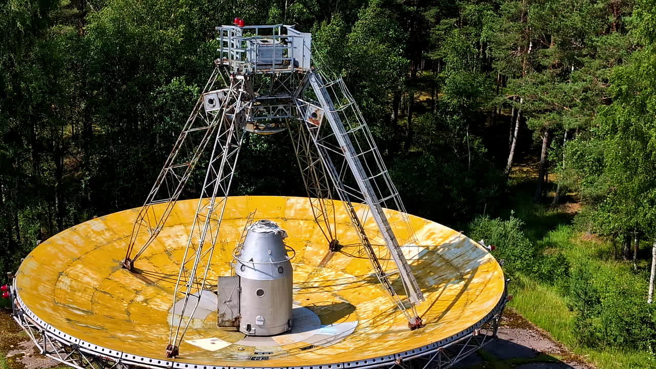 Closeup shot of abandoned disc of RT-32 telescope kept on ground in Irbene, Latva.