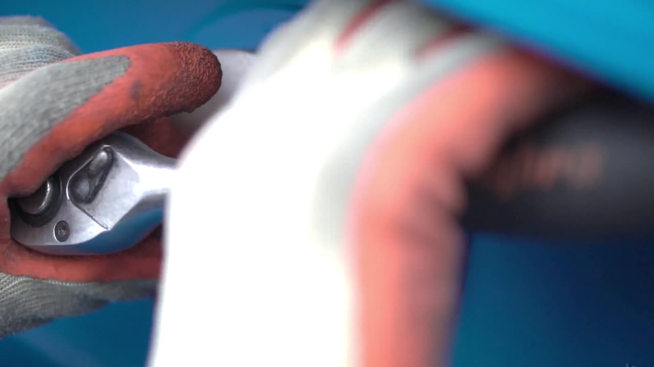 Technician repairing industrial equipment