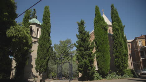 a church view with the tree, cinematic view of the sioni cathedral of the georgian orthodox cathedral in tbilisi