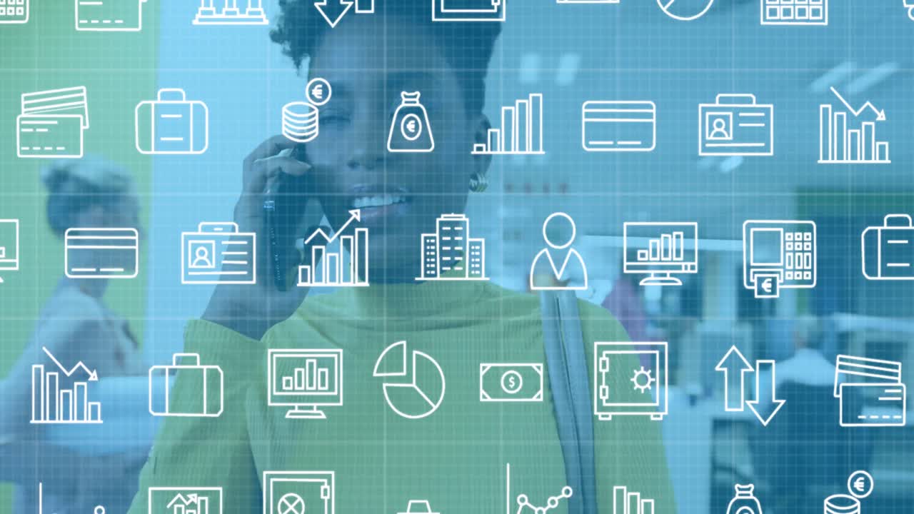 animación de iconos financieros sobre una mujer afroamericana en la oficina que tiene una llamada