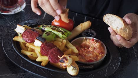 woman eating a turkish breakfast