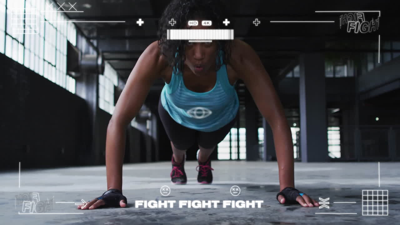 Doing push-ups, woman in gym with fight fight fight text animation over her