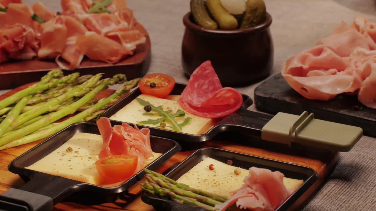 Italian or Spanish restaurant with traditional tapas food, Spanish cuisine, delicious tapas and cheese plate, bruschetta with cheese, olives dry tomatoes and tasty sandwich bar appetizer, buffet