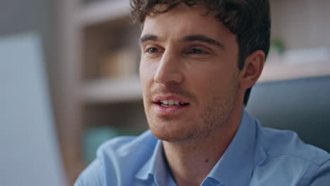 happy man reading documents papers closeup. joyful guy manager analysing report