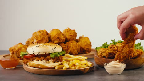 fried chicken, burger and fries