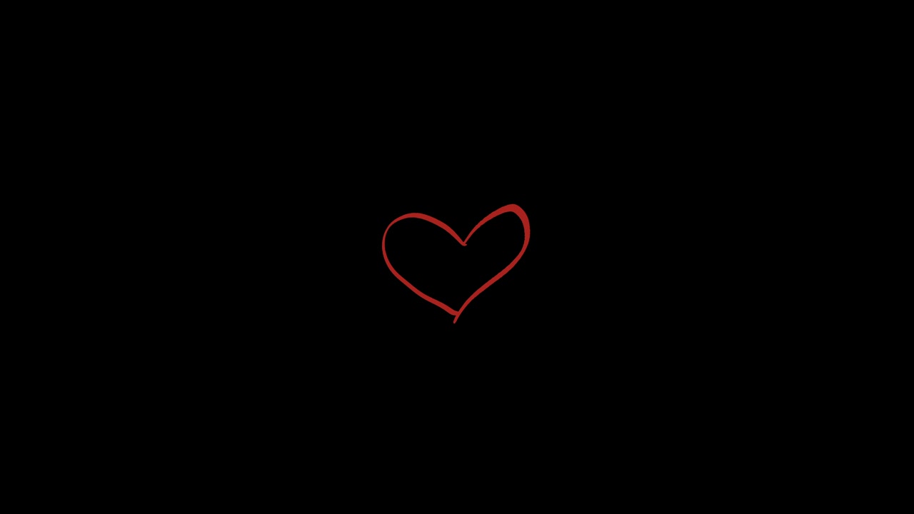 Simbolo di Cuore Rosso Disegnato a Mano su Sfondo Nero