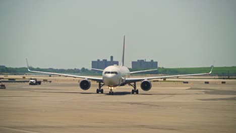 big passenger plain driving towards the gate