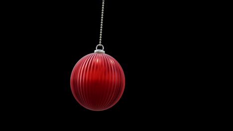 animation of christmas red bauble and snow falling on black background