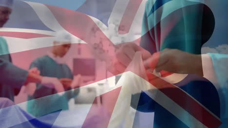 animación de la bandera del reino unido sobre los médicos durante la cirugía